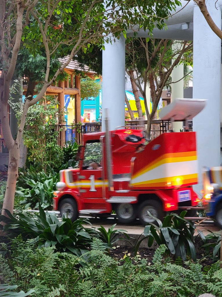 A picture of a semi truck amusement park ride.